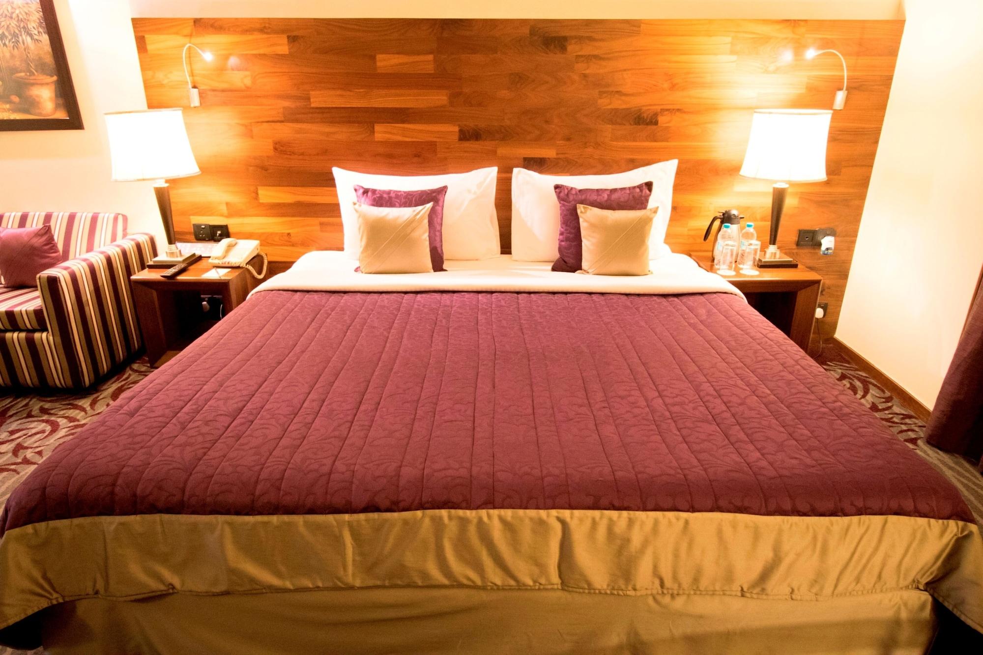 The Orchid Hotel Hinjewadi Πούνε Εξωτερικό φωτογραφία A bed